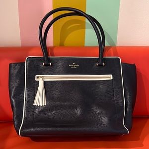 Kate Spade large genuine leather satchel. Navy with white trim and tassel.
